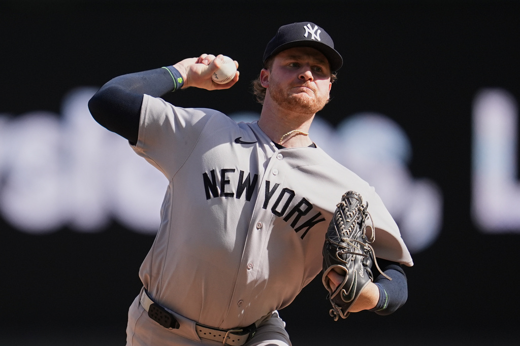 New York Yankees relief pitcher Clarke Schmidt delivers during the seventh inning of a baseball game against the Minnesota Twins, Wednesday, Sept. 16, 2026, in Minneapolis. (AP Photo/Abbie Parr)