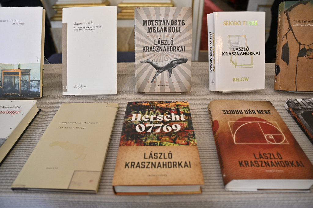 Books by Hungarian author László Krasznahorkai at Börshuset in Stockholm, after he was announced as the recipient of the Nobel Prize in Literature at the Nobel Assembly of the Karolinska Institutet, in Stockholm, Sweden, Thursday, Oct. 9, 2025. (Henrik Montgomery/TT News Agency via AP)