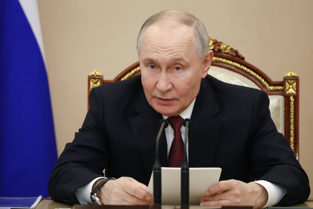Russian President Vladimir Putin speaks during a meeting on the development of domestic integrated electronics at the Kremlin in Moscow, Thursday, Jan. 22, 2026. (Vyacheslav Prokofyev/Sputnik, Kremlin Pool Photo via AP)