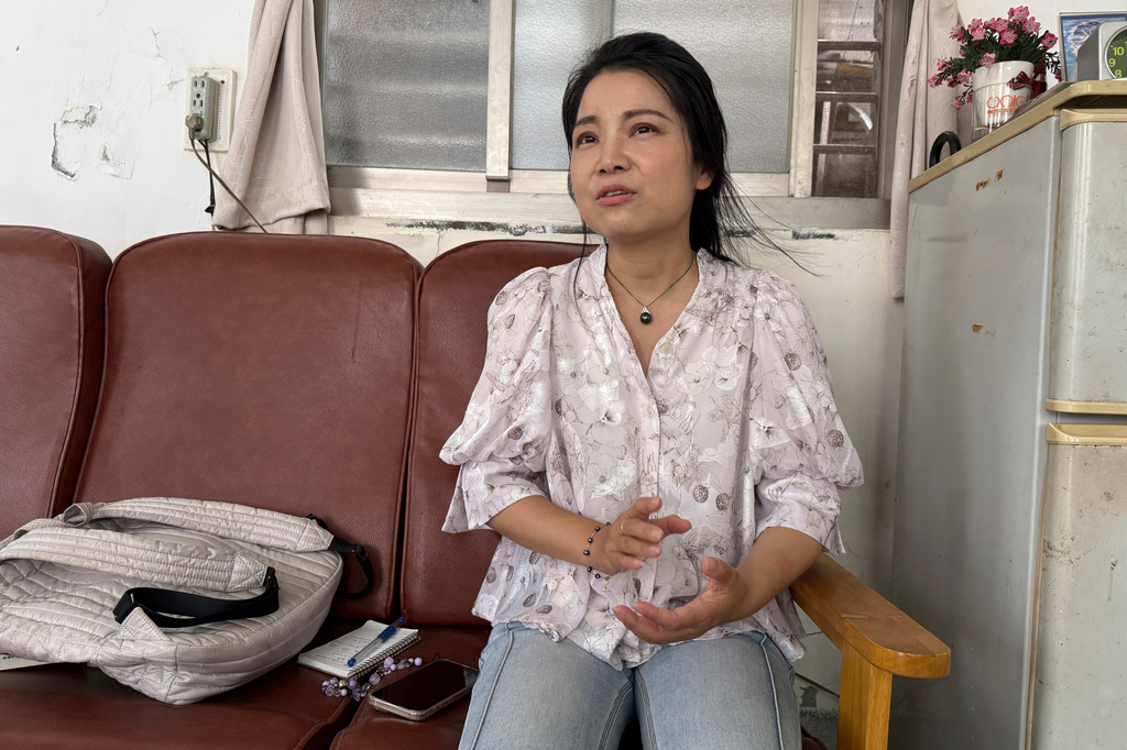 Shang Guan, a writer and activist from China who moved to Taiwan in 2021, speaks during an interview in Taipei, Taiwan, on July 20, 2026. (AP Photo/Johnson Lai)