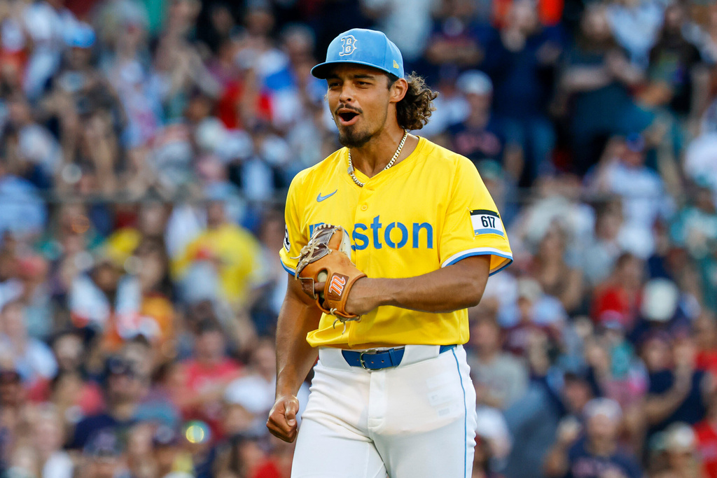 FILE - Boston Red Sox's Jordan Hicks reacts after striking out Houston Astros' Carlos Correa in the eighth inning of a baseball game, Aug. 2, 2025, in Boston. (AP Photo/Greg M. Cooper, File)