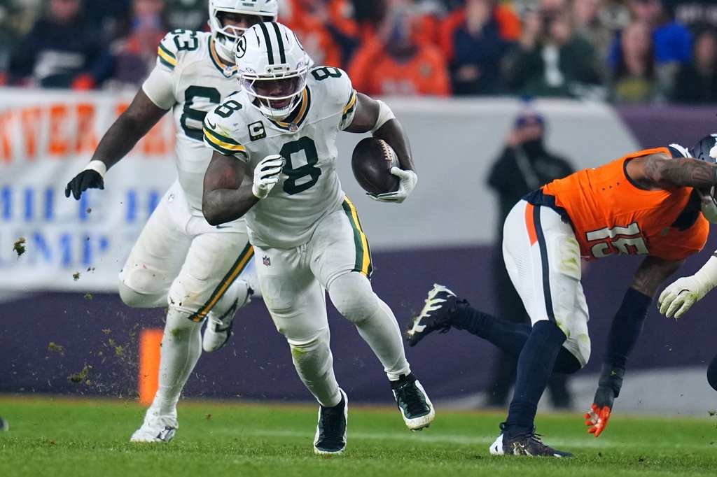 Green Bay Packers' Josh Jacobs runs during the second half of an NFL football game against the Denver Broncos Sunday, Dec. 14, 2025, in Denver. (AP Photo/Jack Dempsey)