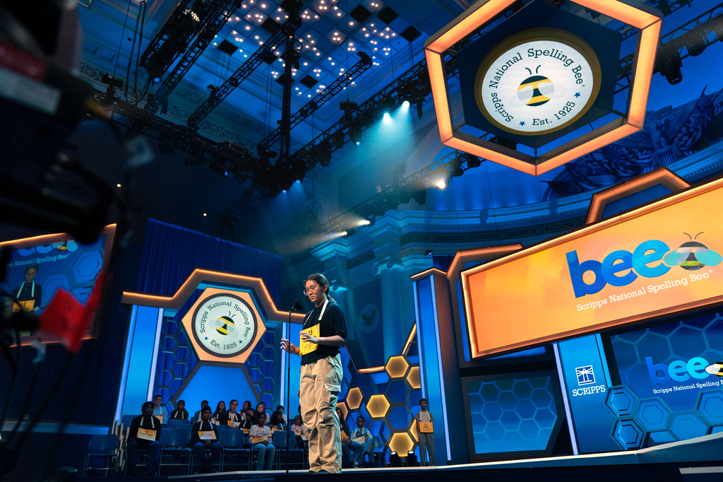 Victoria Li, 12, of Eastvale, Calif., spells his word during the preliminary round of the Scripps National Spelling Bee at DAR Constitution Hall, Tuesday, May 26, 2026, in Washington. (AP Photo/Jose Luis Magana)