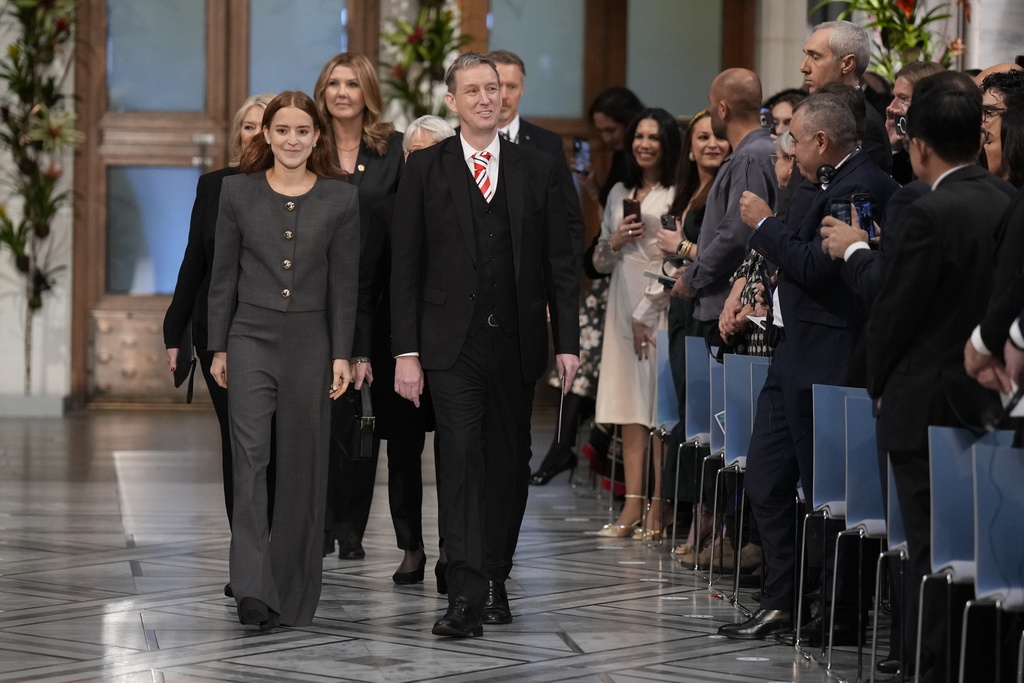 The daughter of the Nobel Peace Prize laureate, Ana Corina Sosa, who will accept the award on behalf of her mother, Venezuelan opposition leader Maria Corina Machado, arrives for the Nobel Peace Prize award ceremony, in Oslo, Norway, Wednesday Dec. 10, 2025. (Ole Berg-Rusten/NTB Scanpix, Pool via AP)