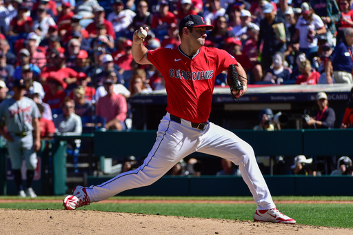 Cleveland Guardians starting pitcher Gavin Williams throws during the third inning of Game 1 of the American League Wild Card baseball playoff series against the Detroit Tigers in Cleveland, Tuesday, Sept. 30, 2025. (AP Photo/Phil Long) Cleveland Guardians starting pitcher Gavin Williams throws during the third inning of Game 1 of the American League Wild Card baseball playoff series against the Detroit Tigers in Cleveland, Tuesday, Sept. 30, 2025. (AP Photo/Phil Long)