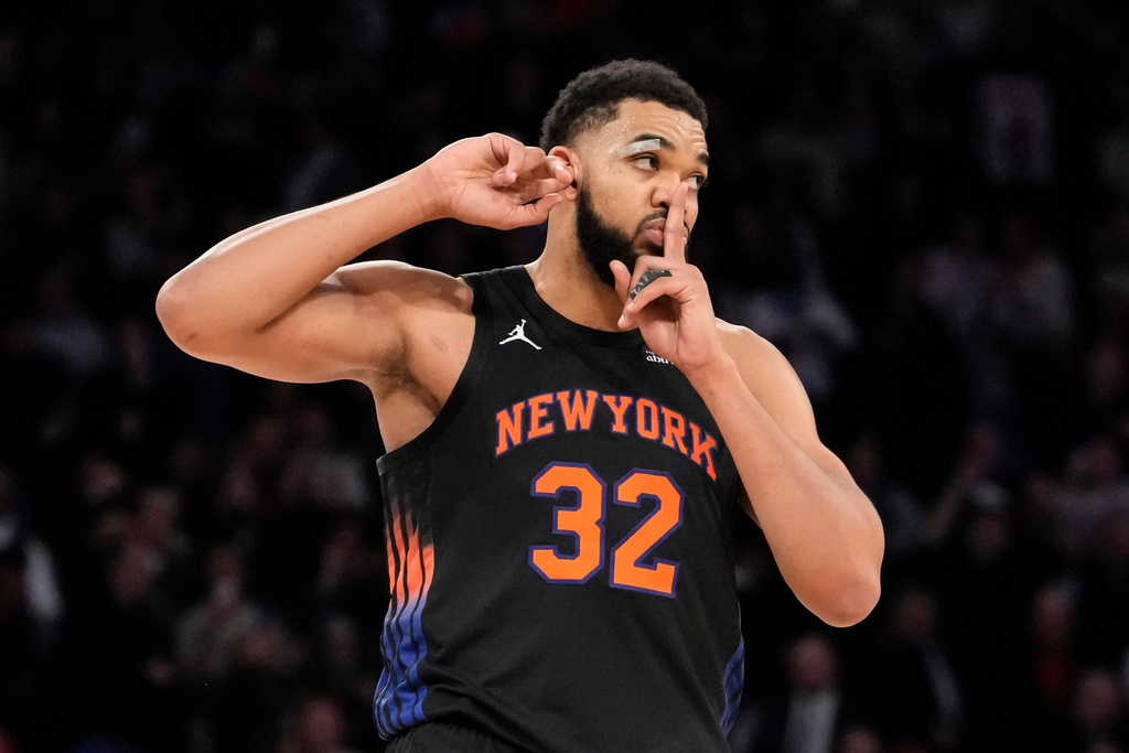 New York Knicks center Karl-Anthony Towns reacts during the second half of an NBA basketball game against the Indiana Pacers, Tuesday, Feb. 10, 2026, in New York. (AP Photo/Yuki Iwamura)
