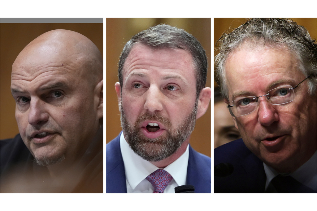 FILE - This photo combination shows, from left, Sen. John Fetterman, D-Pa., in Washington, March 18, 2026, Sen. Markwayne Mullin, R-Okla.,. March 18, 2026 on Capitol Hill in Washington and Sen. Rand Paul, R-Ky., on Capitol Hill in Washington, Feb. 12, 2026, in Washington. (AP Photo/Manuel Balce Ceneta, Tom Brenner, file)