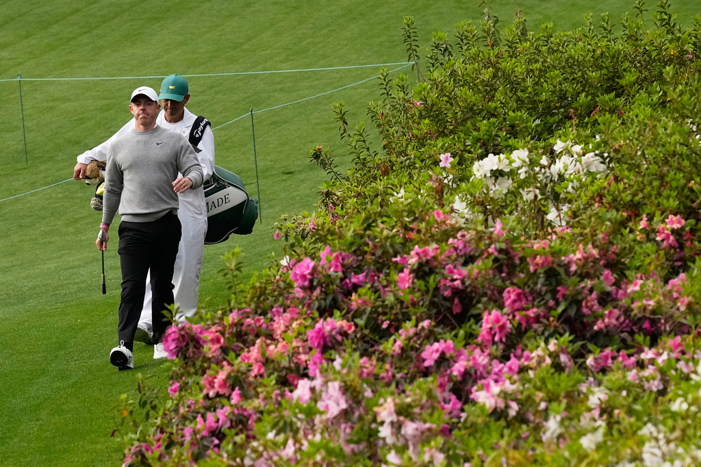 Rory McIlroy, of Northern Ireland, walks to green on the sixth hole during a practice round ahead of the Masters golf tournament at the Augusta National Golf Club, Tuesday, April 7, 2026, in Augusta, Ga. (AP Photo/David J. Phillip)