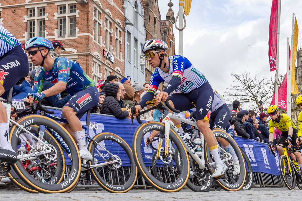 Remco Evenepoel of the Team Red Bull - Bora - Hansgrohe, right, competes during the Tour of Flanders in Oudenaarde, Belgium on Sunday, April 5, 2026. (AP Photo/Geert Vanden Wijngaert)