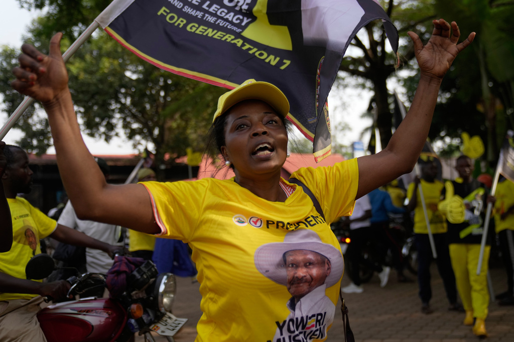 A woman celebrates Ugandan President Yoweri Museveni's victory in the presidential election in Kampala, Uganda, Saturday, Jan. 17, 2026. (AP Photo/Brian Inganga)