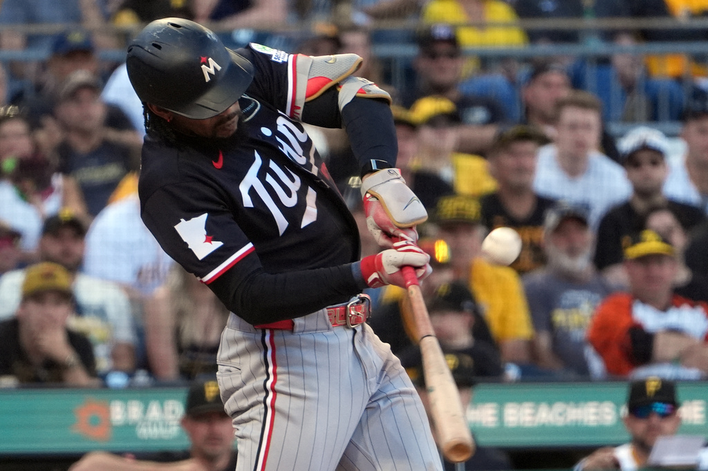 Minnesota Twins' Byron Buxton singles off Pittsburgh Pirates pitcher Mason Montgomery int the eighth inning of a baseball game in Pittsburgh, Saturday, May 30, 2026. (AP Photo/Tom E. Puskar)