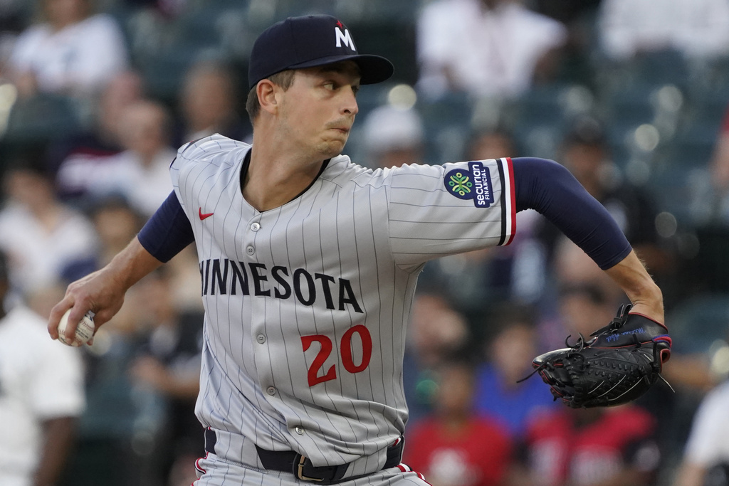 Minnesota Twins pitcher Mick Abel throws the ball against the Chicago White Sox during the first inning of a baseball game Saturday, Aug. 23, 2025, in Chicago. (AP Photo/David Banks)