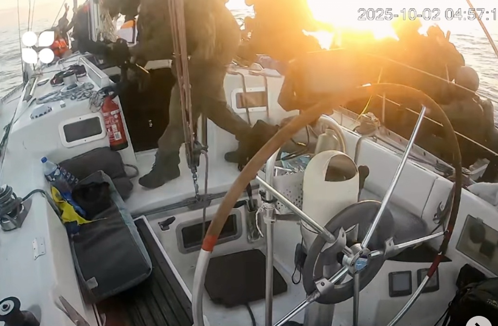 This frame grab from video released by the Global Summed Flotilla shows as Israeli navy soldiers board one of the flotilla vessels as they approach the coast of Gaza early Thursday Oct. 2, 2025. (Global Sumud Flottila via AP)