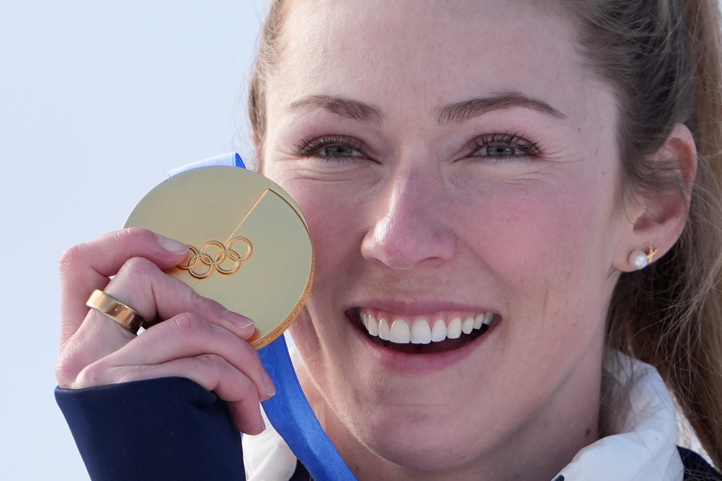 United States' Mikaela Shiffrin celebrates winning the gold medal in an alpine ski, women's slalom race, at the 2026 Winter Olympics, in Cortina d'Ampezzo, Italy, Wednesday, Feb. 18, 2026. (AP Photo/Jacquelyn Martin)