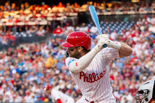 FILE - Philadelphia Phillies' Bryce Harper takes an at-bat during the first inning of a baseball game against the San Francisco Giants, April 14, 2025, in Philadelphia. (AP Photo/Chris Szagola, File) FILE - Philadelphia Phillies' Bryce Harper takes an at-bat during the first inning of a baseball game against the San Francisco Giants, April 14, 2025, in Philadelphia. (AP Photo/Chris Szagola, File)