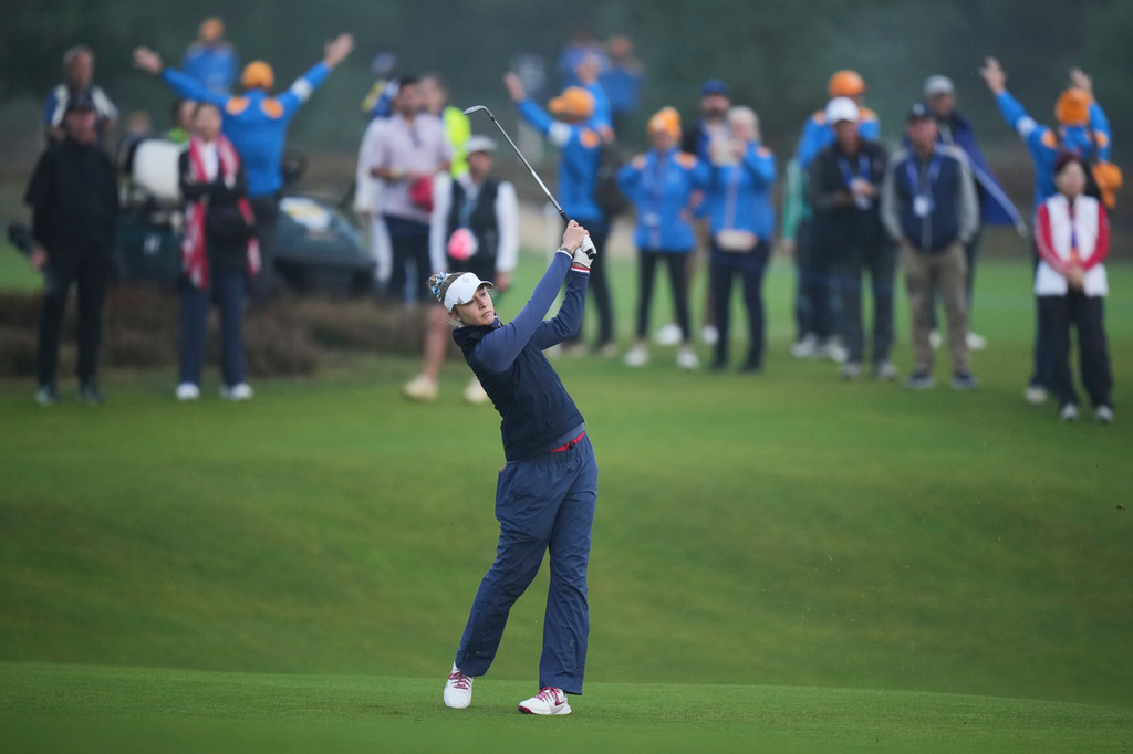 Nelly Korda of the United States plays a shot into the first green during the Solheim Cup at the Bernardus Golf course in Den Bosch, Netherlands, Saturday, Sept. 12, 2026. (AP Photo/Alastair Grant)