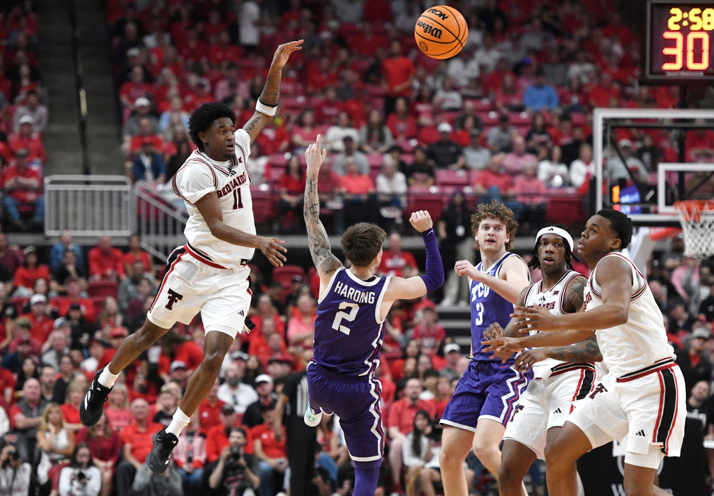 Texas Tech guard Jaylen Petty (11) jumps for the ball during the first half in an NCAA college basketball game against TCU, Tuesday, March 3, 2026, in Lubbock, Texas. (AP Photo/Annie Rice)