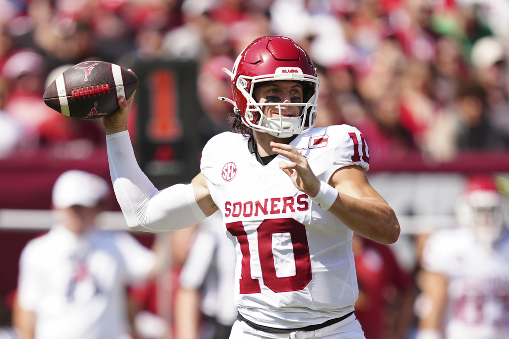 Oklahoma quarterback John Mateer throws a pass during the first half of an NCAA college football game against Temple, Saturday, Sept. 13, 2025, in Philadelphia. (AP Photo/Derik Hamilton)