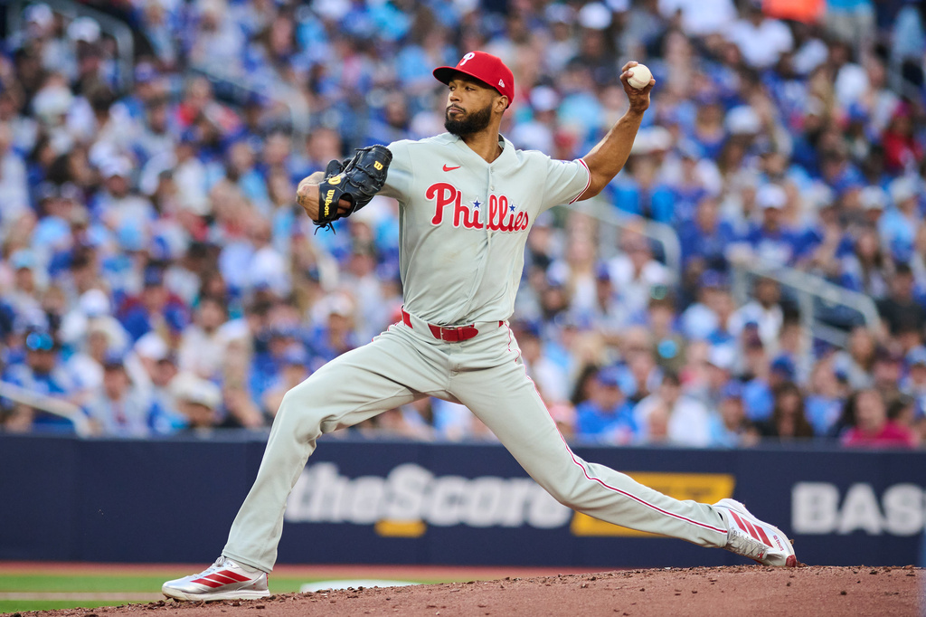 Philadelphia Phillies' Cristopher Sanchez works against the Toronto Blue Jays during second-inning baseball game action in Toronto, Monday, June 8, 2026. (Sammy Kogan/The Canadian Press via AP)