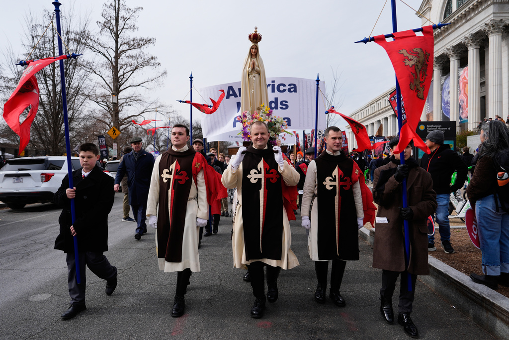 Anti-abortion demonstrators are seen before the annual March for Life, Friday, Jan. 23, 2026, in Washington. (AP Photo/Julia Demaree Nikhinson)