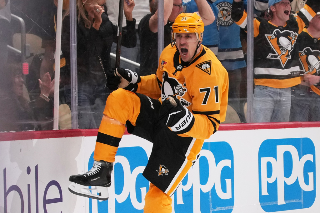 Pittsburgh Penguins' Evgeni Malkin celebrates his goal during the second period of Game 1 in the first round of the NHL Stanley Cup playoffs against the Philadelphia Flyers in Pittsburgh, Saturday, April 18, 2026. (AP Photo/Gene J. Puskar)