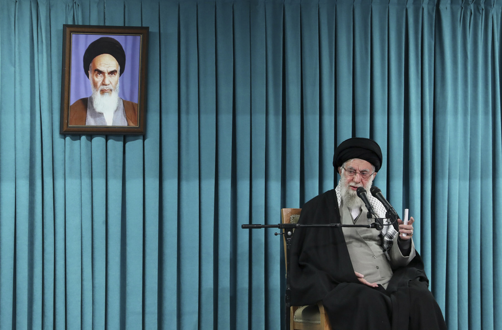 FILE - In this photo released by the official website of the office of the Iranian supreme leader, Supreme Leader Ayatollah Ali Khamenei speaks under a portrait of the late revolutionary founder Ayatollah Khomeini, in a ceremony meeting a group of officials, in Tehran, Iran, March 8, 2025. (Office of the Iranian Supreme Leader via AP, File)