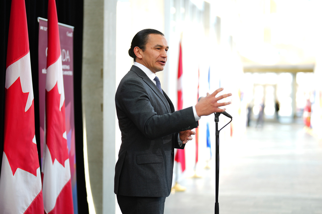 FILE - Manitoba Premier Wab Kinew talks to media as he arrives for a first ministers meeting in Ottawa on Jan.15, 2025. (Sean Kilpatrick/The Canadian Press via AP, File)