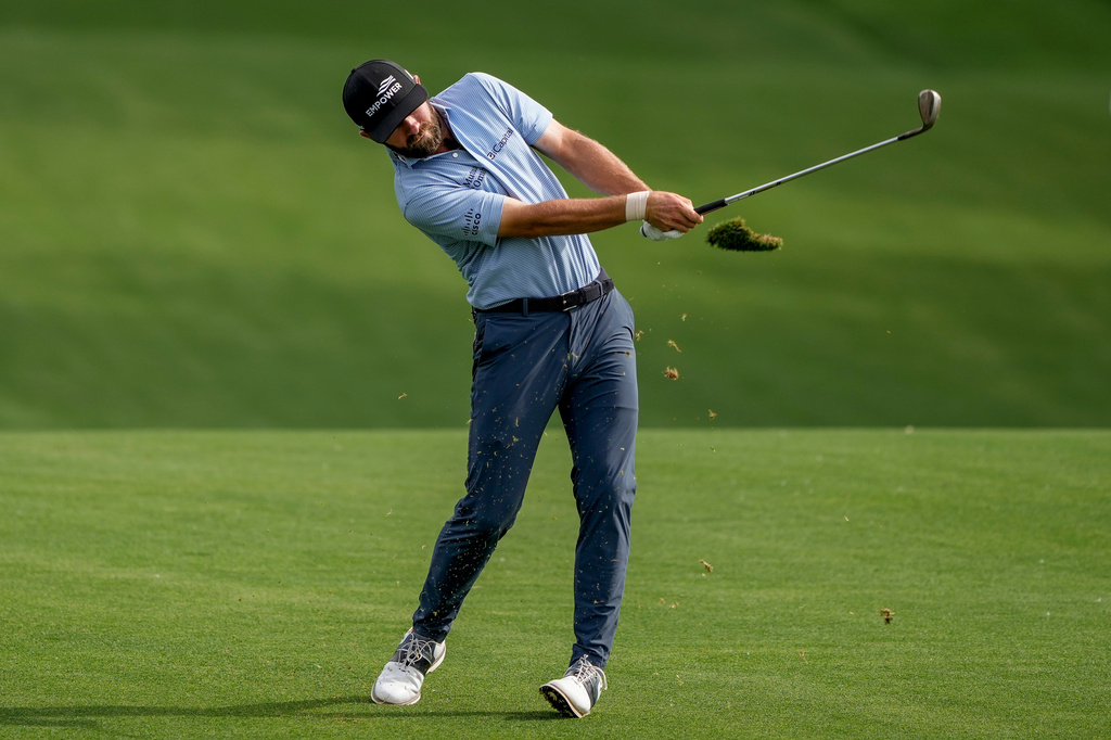 Cameron Young hits from the 14th fairway during third round of the Truist Championship golf tournament at the Quail Hollow Club, Saturday, May 9, 2026, in Charlotte, N.C. (AP Photo/Chris Carlson)