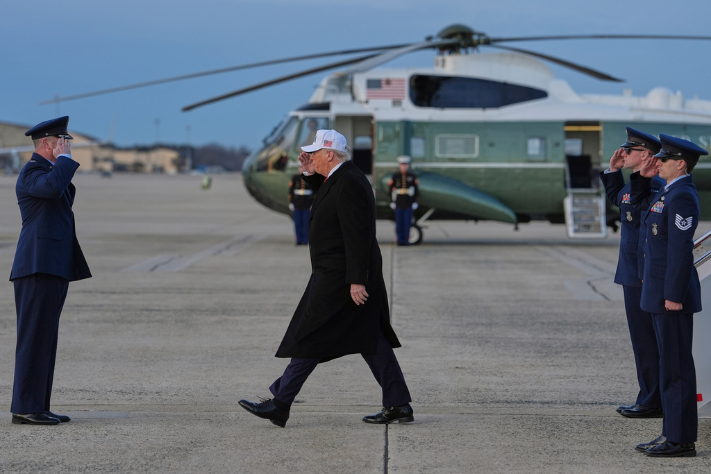 President Donald Trump arrives at Joint Base Andrews, Tuesday, Jan. 13, 2026, in Joint Base Andrews, Md. (AP Photo/Evan Vucci)