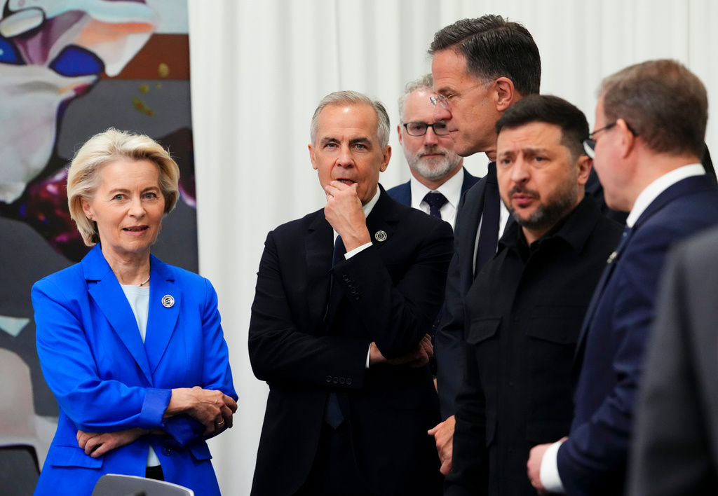 President of the European Commission Ursula von der Leyen, left to right, Canada Prime Minister Mark Carney, Secretary General of NATO Mark Rutte and President of Ukraine Volodymyr Zelenskyy talk prior to a meeting on the situation in Ukraine during the 8th European Political Community Summit in Yerevan, Armenia on Monday, May 4, 2026. (Sean Kilpatrick/The Canadian Press via AP)