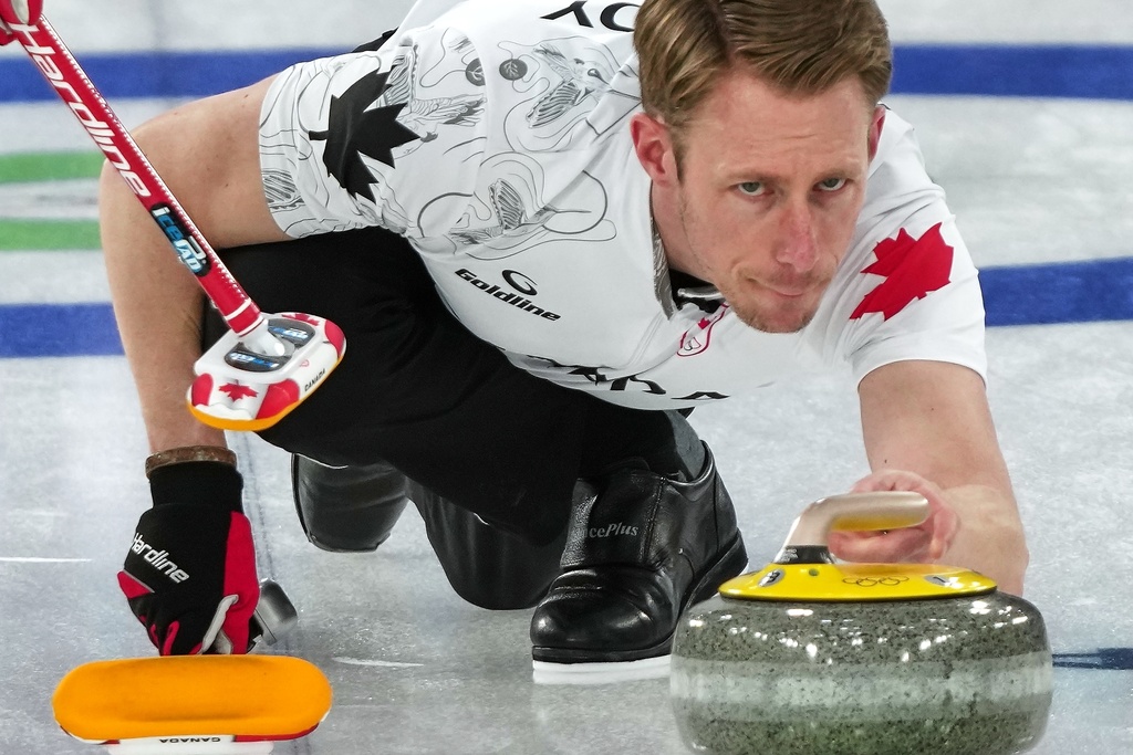 Canada's Marc Kennedy in action during the men's curling round robin session against Czechia, at the 2026 Winter Olympics, in Cortina d'Ampezzo, Italy, Monday, Feb. 16, 2026. (AP Photo/Misper Apawu)
