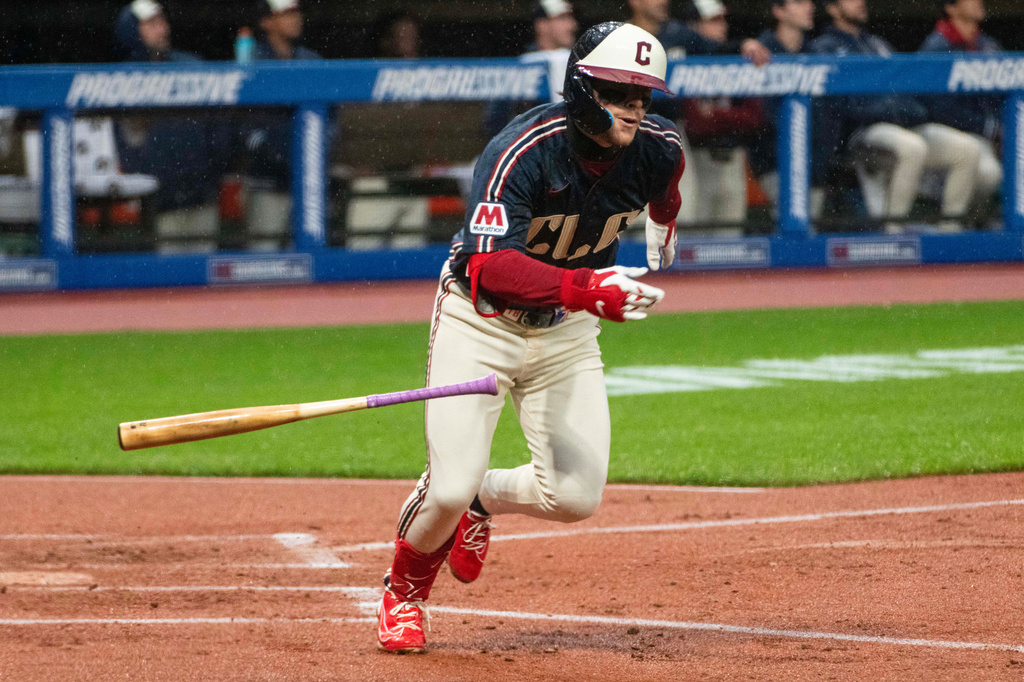Cleveland Guardians' Travis Bazzana heads to first base after hitting his first major league home run off Minnesota Twins starting pitcher Connor Prielipp during the first inning of a baseball game, Friday, May 8, 2026, in Cleveland. (AP Photo/Phil Long)