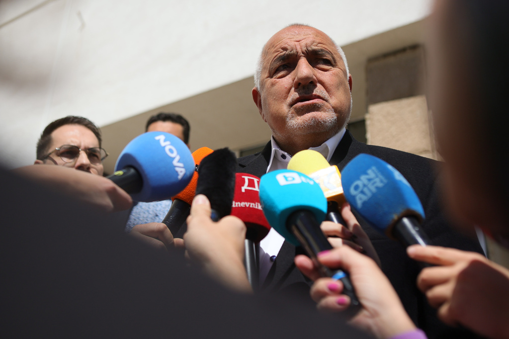 Former Prime Minister Boyko Borissov speaks to journalists after casting his vote in a polling station in Bankya, Bulgaria, Sunday, April 19, 2026, during early parliamentary elections. (AP Photo/Valentina Petrova)