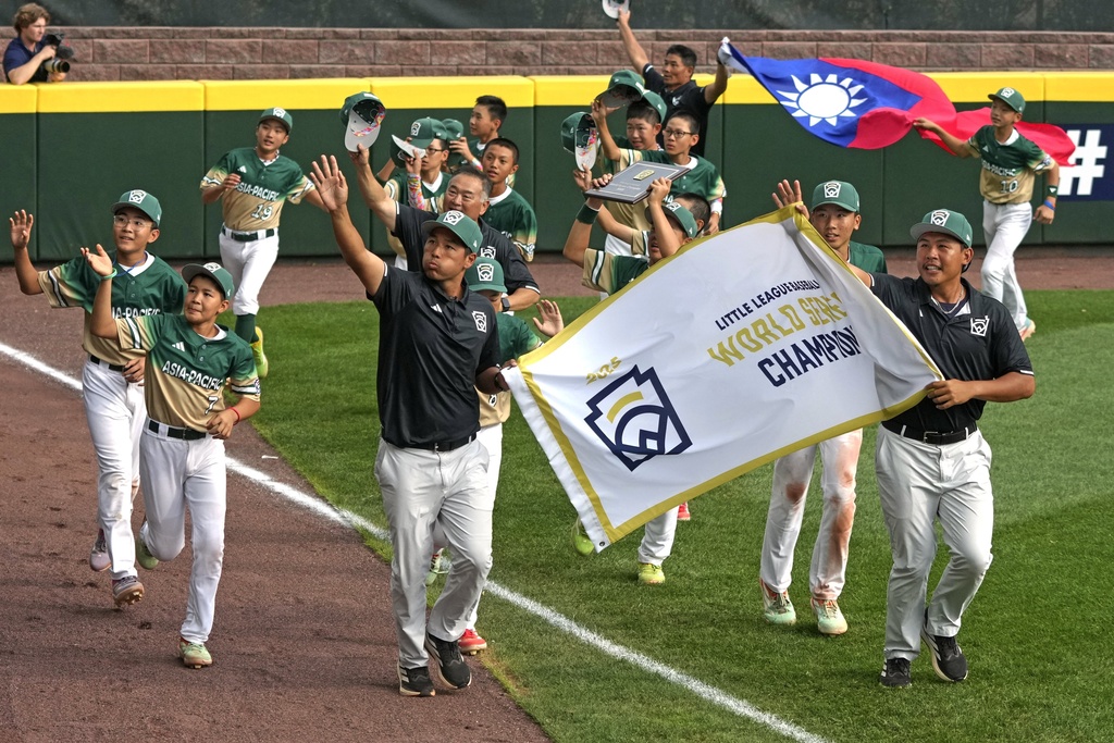 Taiwan takes a victory lap of the Lamade Stadium after winning the Little League World Series Championship game against Las Vegas, Nev. in South Williamsport, Pa., Sunday, Aug. 24, 2025. (AP Photo/Gene J. Puskar)