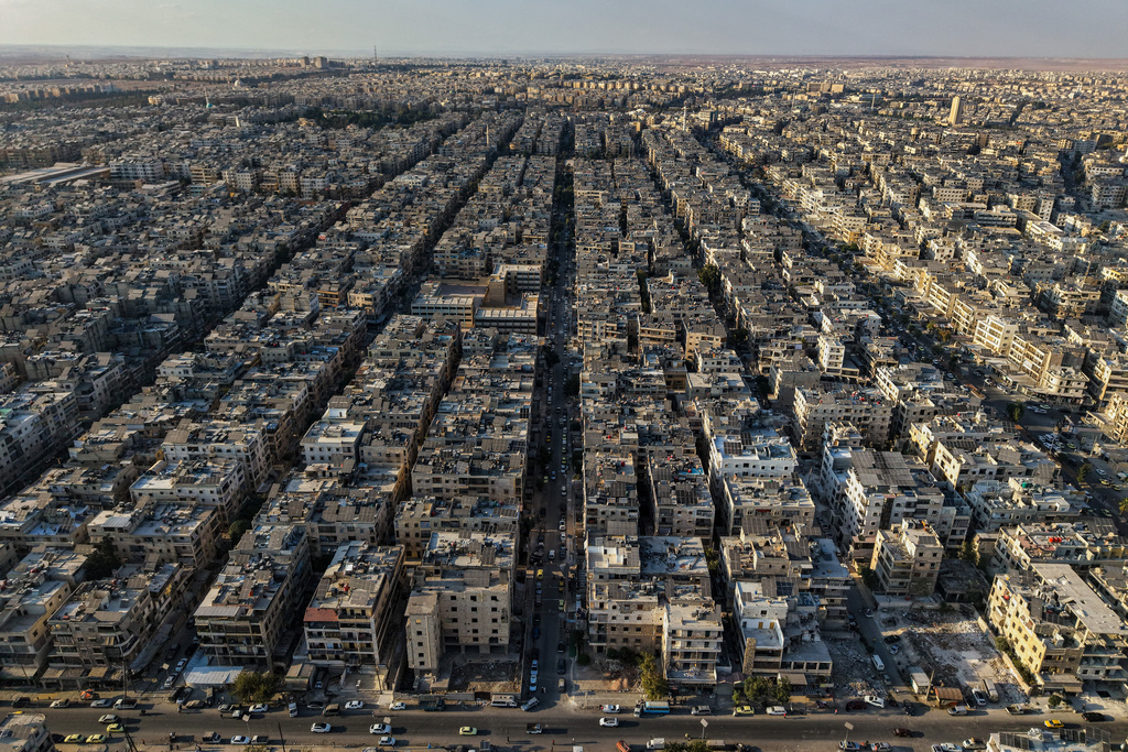 A general view shows the Sheikh Maqsoud neighborhood of Aleppo, Syria, Tuesday, Oct. 7, 2025. (AP Photo/Omar Albam)