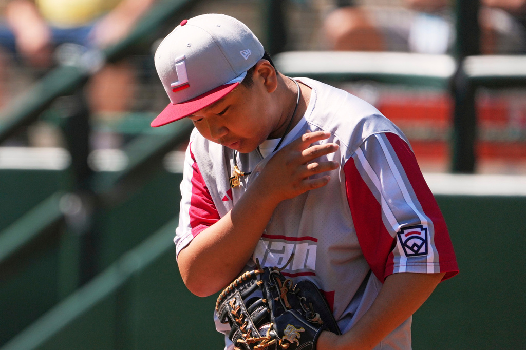 Japan's Yunosuke Yabe (22) collects himself on the mound during the third inning of the International Championship baseball game against Curacao at the Little League World Series tournament in South Williamsport, Pa., Saturday, Aug. 29, 2026. (AP Photo/Gene J. Puskar)