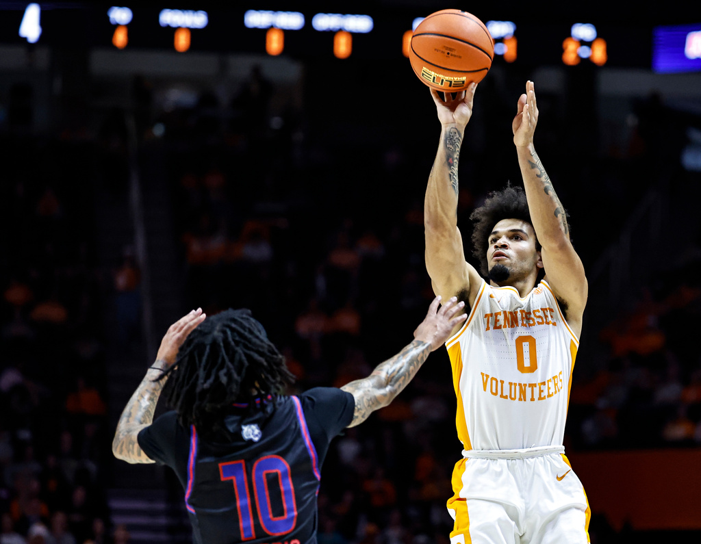 Tennessee guard Ja'Kobi Gillespie (0) shoots over Tennessee State guard Dante Harris (10) during the first half of an NCAA college basketball game Thursday, Nov. 20, 2025, in Knoxville, Tenn. (AP Photo/Wade Payne)