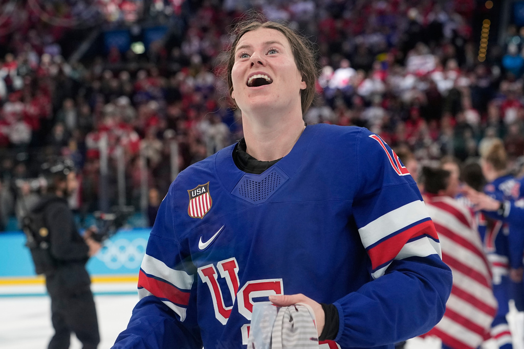 United States' Kelly Pannek (12) celebrates after a women's ice hockey gold medal game between the United States and Canada at the 2026 Winter Olympics, in Milan, Italy, Thursday, Feb. 19, 2026. (AP Photo/Hassan Ammar)
