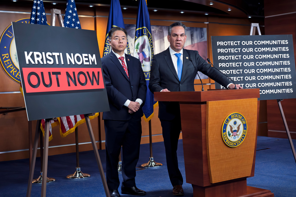 Rep. Ted Lieu, D-Calif., left, and Rep. Pete Aguilar, D-Calif., chair of the House Democratic Caucus, meet with reporters ahead of a key procedural vote to end the partial government shutdown as they talk about demands for ICE to end abuse during immigration enforcement operations at the Capitol in Washington, Tuesday, Feb. 3, 2026. (AP Photo/J. Scott Applewhite)