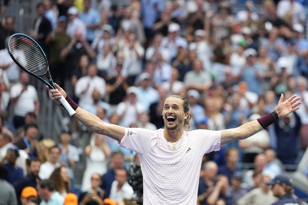 Alexander Zverev, of Germany, celebrates after he won the men's singles final of the U.S. Open tennis championships against Ben Shelton, of the United States, Sunday, Sept. 13, 2026, in New York. (AP Photo/Kirsty Wigglesworth)