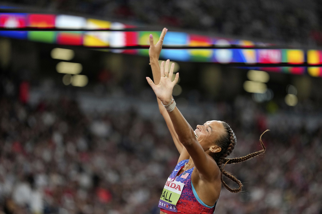 United States' Anna Hall crosses the finish line in the heptathlon 800 meters at the World Athletics Championships in Tokyo, Saturday, Sept. 20, 2025. (AP Photo/Matthias Schrader)