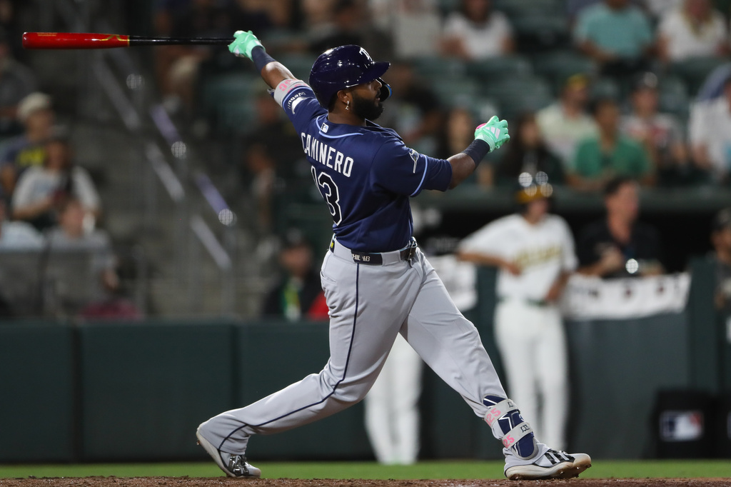 Tampa Bay Rays' Junior Caminero watches his three-run home run during the eighth inning of a baseball game against the Athletics Monday, Aug. 10, 2026, in West Sacramento, Calif. (AP Photo/Scott Marshall)