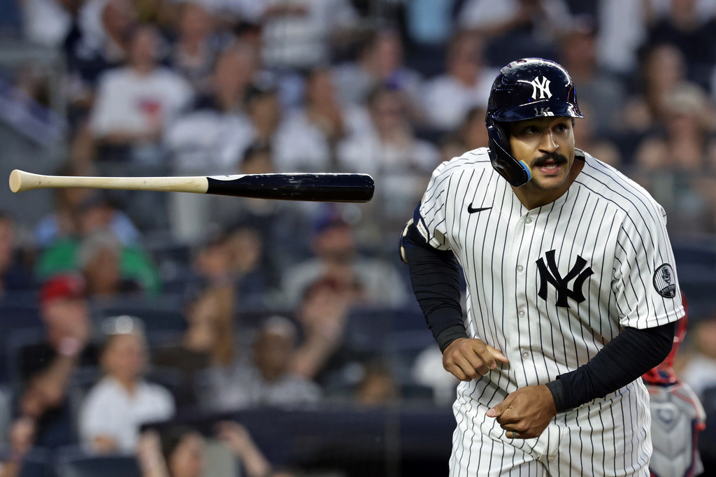 New York Yankees' Trent Grisham reacts after hitting a solo home run during the fifth inning of a baseball game against the Boston Red Sox, Friday, June 5, 2026, in New York. (AP Photo/Adam Hunger)