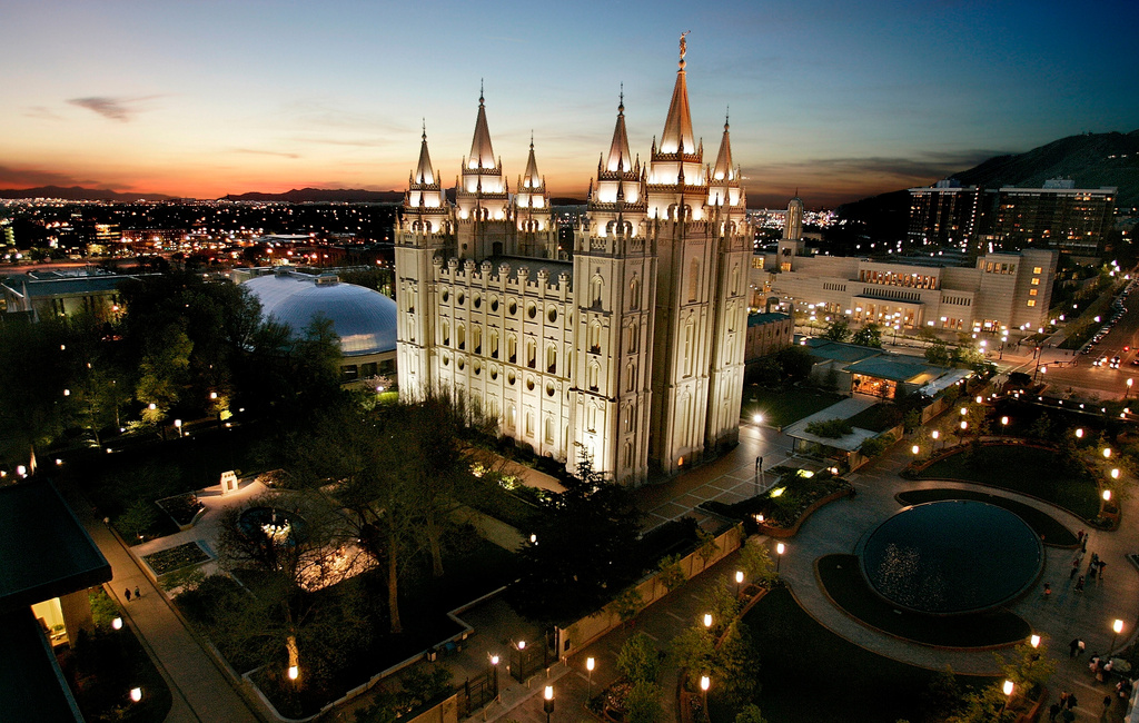 FILE - The sun sets behind the Mormon Temple, the centerpiece of Temple Square, in Salt Lake City, April 27, 2006. (AP Photo/Douglas C. Pizac, File)