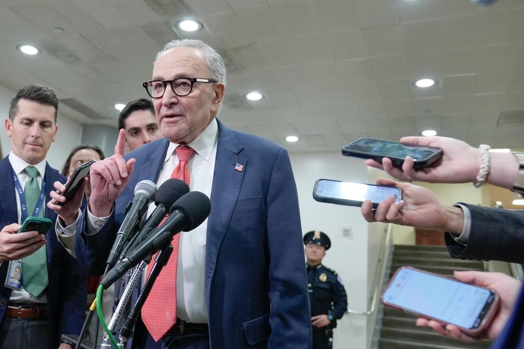 Sen. Minority Leader Chuck Schumer of N.Y., speaks with reporters at the Capitol Subway on the 36th day of the government shutdown, Wednesday, Nov. 5, 2025, in Washington. (AP Photo/Mariam Zuhaib)