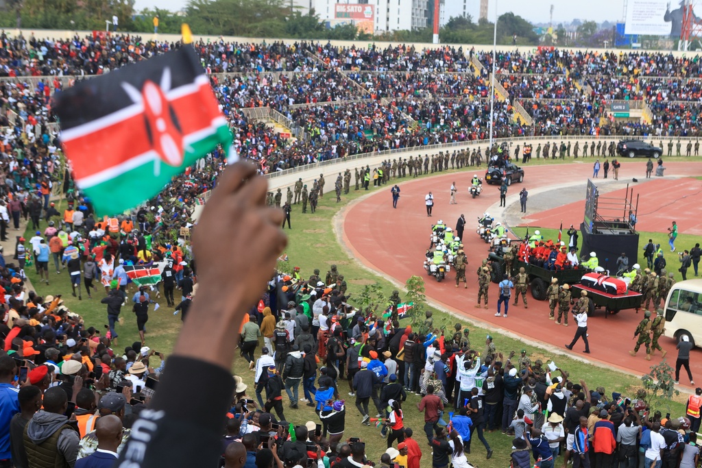 The coffin carrying the remains of former Kenya Prime Minister Raila Odinga arrives for his state funeral at Nyayo National Stadium in Nairobi, Kenya, Friday, Oct. 17, 2025. (AP Photo/Andrew Kasuku)
