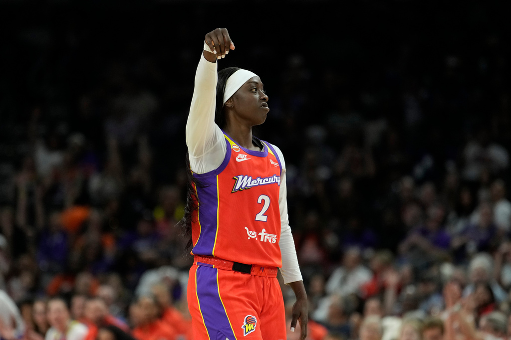 Phoenix Mercury guard Kahleah Copper celebrates a 3-pointer against the Seattle Storm during the second half of a WNBA basketball game, Thursday, July 2, 2026, in Phoenix. (AP Photo/Ross D. Franklin)