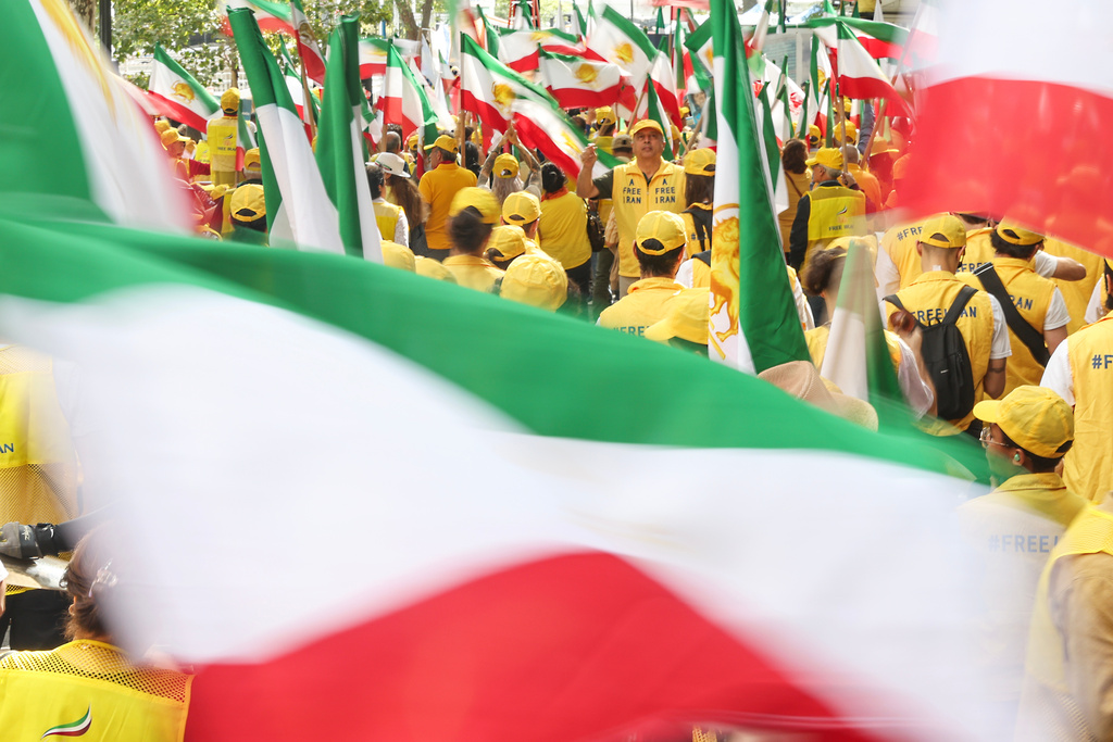 Crowds of people rally against the Iranian government during the 80th session of the United Nations General Assembly, Tuesday, Sept. 23, 2025, in New York. (AP Photo/Heather Khalifa)