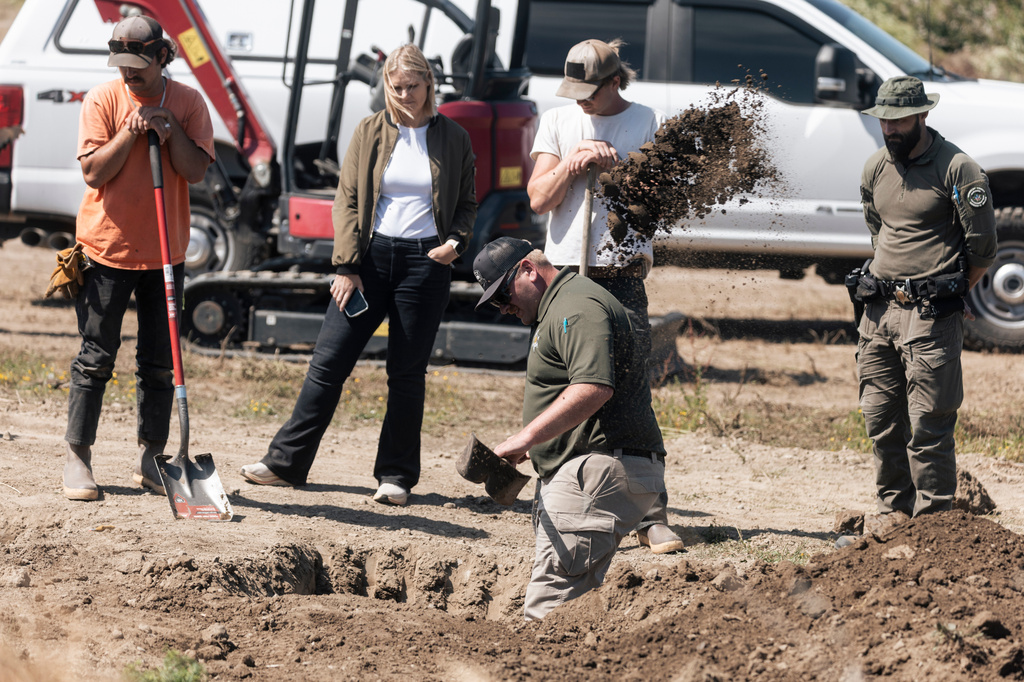 Investigators search for animal remains while executing a second search warrant at Miranda's Rescue as part of an active investigation into alleged animal cruelty, fraud, and theft in Fortuna, Calif., on Tuesday, June 23, 2026. (Stephen Lam/San Francisco Chronicle via AP)