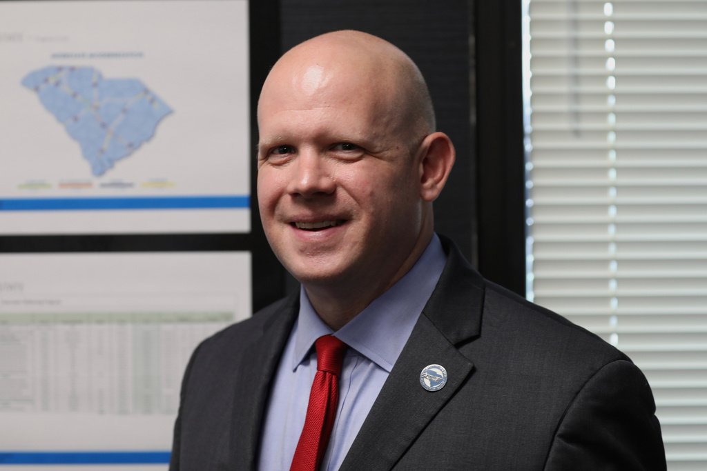 South Carolina Department of Transportation Secretary Justin Powell is photographed in his office in Columbia, S.C., on Wednesday, Aug. 13, 2025. (AP Photo/Jeffrey Collins)